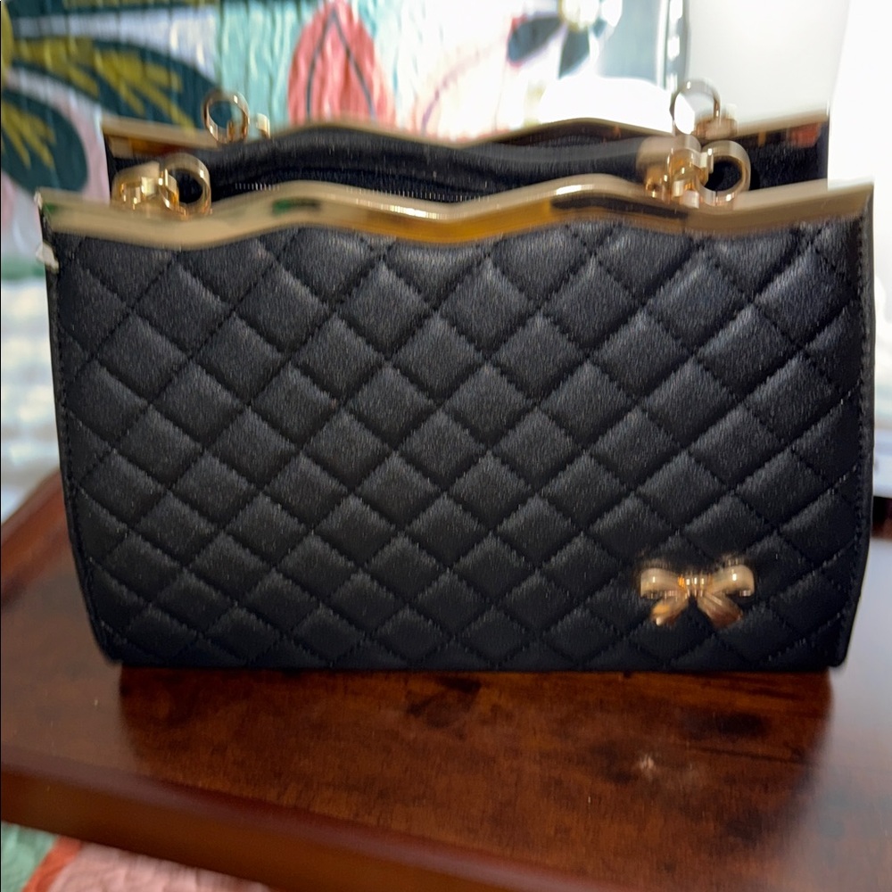 Black Quilted Women's Chain Shoulder Bag with Gold Bow Accent